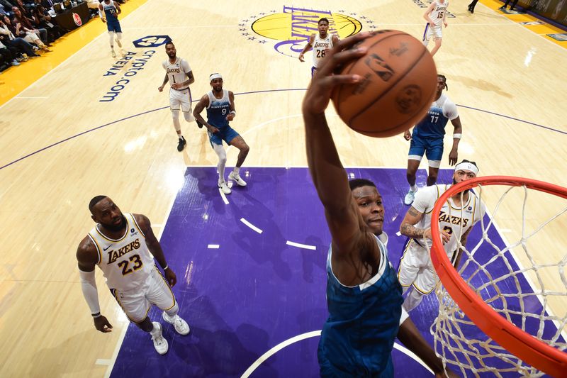 LOS ANGELES, CA - MARCH 10: Anthony Edwards #5 of the Minnesota Timberwolves dunks the ball during the game against the Minnesota Timberwolves on March 10, 2024 at Crypto.Com Arena in Los Angeles, California. NOTE TO USER: User expressly acknowledges and agrees that, by downloading and/or using this Photograph, user is consenting to the terms and conditions of the Getty Images License Agreement. Mandatory Copyright Notice: Copyright 2024 NBAE (Photo by Adam Pantozzi/NBAE via Getty Images)