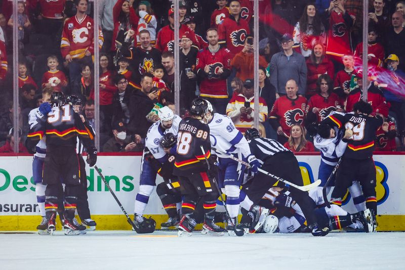 Jan 21, 2023; Calgary, Alberta, CAN; Calgary Flames and Tampa Bay Lightning players get into a scrum during the second period at Scotiabank Saddledome. Mandatory Credit: Sergei Belski-USA TODAY Sports