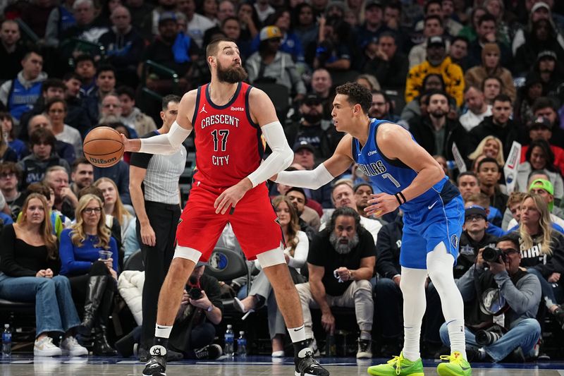 DALLAS, TX - JANUARY 13: Jonas Valanciunas #17 of the New Orleans Pelicans handles the ball during the game against the Dallas Mavericks on January 13, 2024 at the American Airlines Center in Dallas, Texas. NOTE TO USER: User expressly acknowledges and agrees that, by downloading and or using this photograph, User is consenting to the terms and conditions of the Getty Images License Agreement. Mandatory Copyright Notice: Copyright 2024 NBAE (Photo by Glenn James/NBAE via Getty Images)