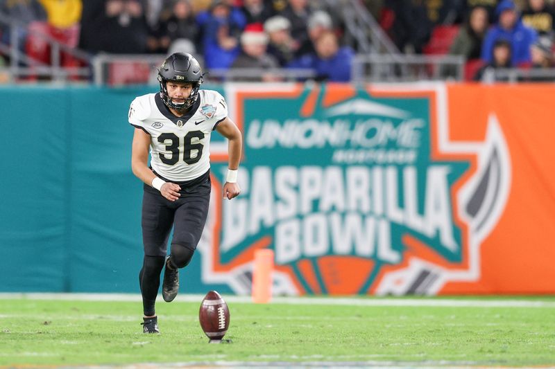 Dec 23, 2022; Tampa, Florida, USA; Wake Forest Demon Deacons place kicker Ivan Mora (36) kicks off against the Missouri Tigers in the second quarter in the 2022 Gasparilla Bowl at Raymond James Stadium. Mandatory Credit: Nathan Ray Seebeck-USA TODAY Sports