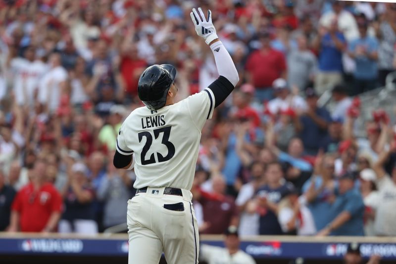 Oct 3, 2023; Minneapolis, Minnesota, USA; Minnesota Twins short stop Royce Lewis (23) reacts after hitting a two-run home run in the first inning against the Toronto Blue Jays during game one of the Wildcard series for the 2023 MLB playoffs at Target Field. Mandatory Credit: Jesse Johnson-USA TODAY Sports