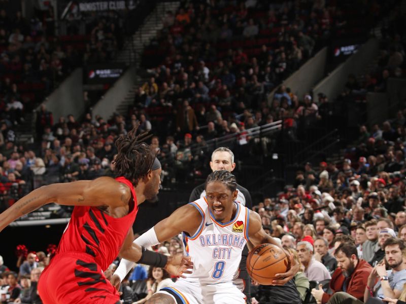 PORTLAND, OR - JANUARY 26: Jalen Williams #8 of the Oklahoma City Thunder handles the ball during the game against the Portland Trail Blazers on January 26, 2025 at the Moda Center Arena in Portland, Oregon. NOTE TO USER: User expressly acknowledges and agrees that, by downloading and or using this photograph, user is consenting to the terms and conditions of the Getty Images License Agreement. Mandatory Copyright Notice: Copyright 2025 NBAE (Photo by Cameron Browne/NBAE via Getty Images)