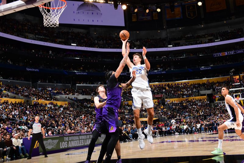 LOS ANGELES, CA - NOVEMBER 21: Franz Wagner #22 of the Orlando Magic shoots the ball during the game against the Los Angeles Lakers on November 21, 2024 at Crypto.Com Arena in Los Angeles, California. NOTE TO USER: User expressly acknowledges and agrees that, by downloading and/or using this Photograph, user is consenting to the terms and conditions of the Getty Images License Agreement. Mandatory Copyright Notice: Copyright 2024 NBAE (Photo by Adam Pantozzi/NBAE via Getty Images)