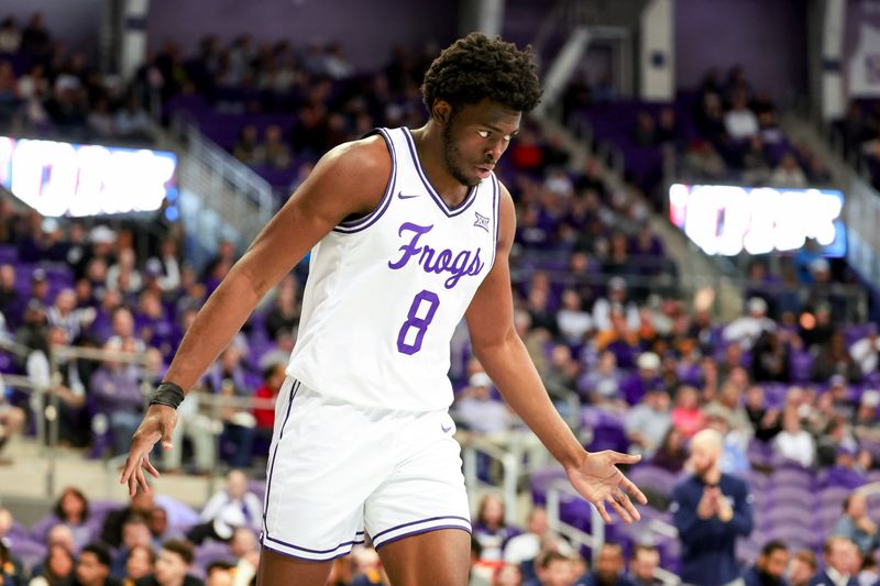 Feb 12, 2024; Fort Worth, Texas, USA;  TCU Horned Frogs center Ernest Udeh Jr. (8) reacts during the second half against the West Virginia Mountaineers at Ed and Rae Schollmaier Arena. Mandatory Credit: Kevin Jairaj-USA TODAY Sports