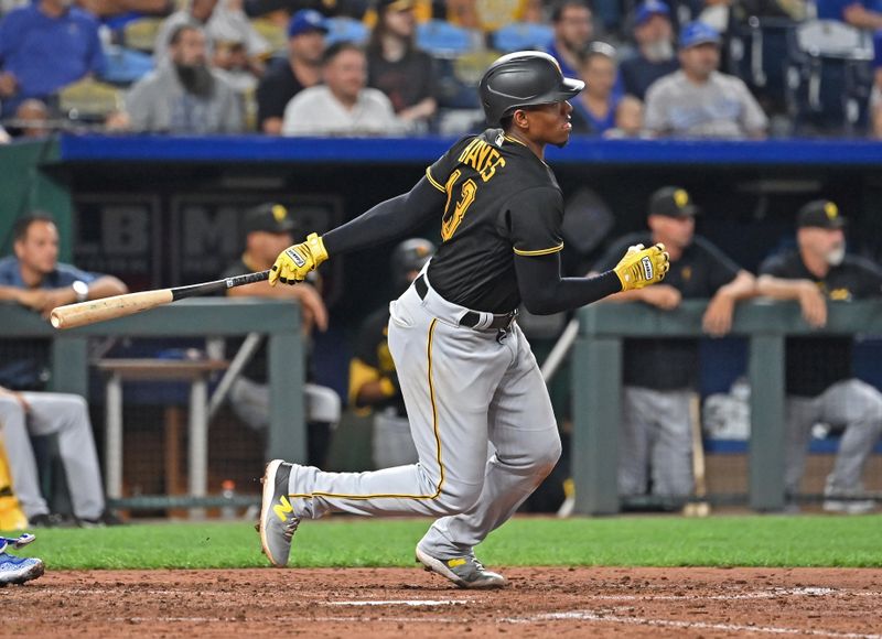 Aug 28, 2023; Kansas City, Missouri, USA;  Pittsburgh Pirates third baseman Ke'Bryan Hayes (13) singles in the seventh inning against the Kansas City Royals at Kauffman Stadium. Mandatory Credit: Peter Aiken-USA TODAY Sports