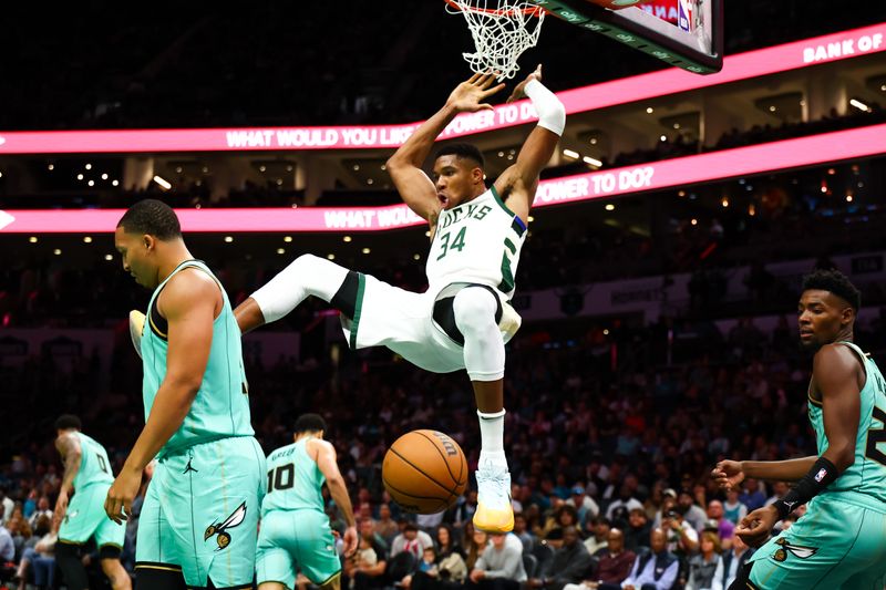 CHARLOTTE, NORTH CAROLINA - NOVEMBER 16: Giannis Antetokounmpo #34 of the Milwaukee Bucks dunks the ball during the second half of a basketball game against the Charlotte Hornets at Spectrum Center on November 16, 2024 in Charlotte, North Carolina. NOTE TO USER: User expressly acknowledges and agrees that, by downloading and or using this photograph, User is consenting to the terms and conditions of the Getty Images License Agreement. (Photo by David Jensen/Getty Images)