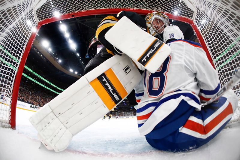 Dec 18, 2025; Boston, Massachusetts, USA; Boston Bruins goaltender Jeremy Swayman (1) tries to get Edmonton Oilers left wing Zach Hyman (18) out of his goal during the second period at TD Garden. Mandatory Credit: Winslow Townson-Imagn Images