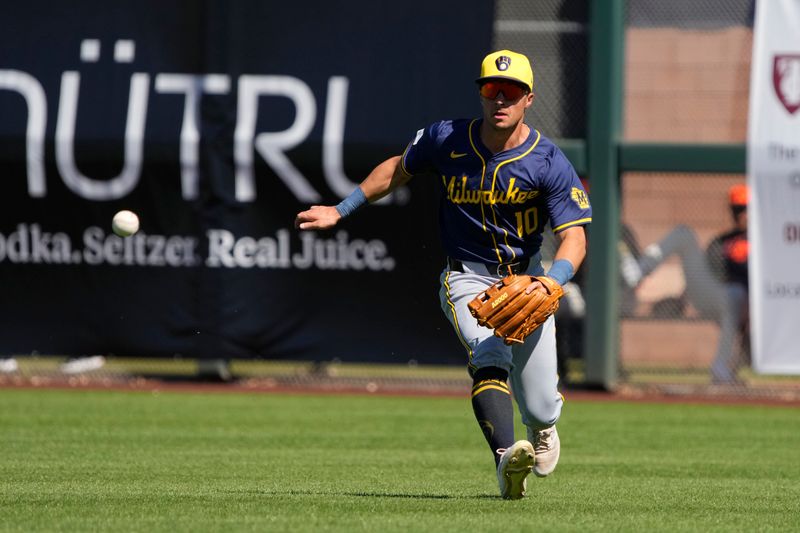 Mar 5, 2024; Scottsdale, Arizona, USA; Milwaukee Brewers outfielder Sal Frelick (10) goes after the ball against the San Francisco Giants in the second inning at Scottsdale Stadium. Mandatory Credit: Rick Scuteri-USA TODAY Sports