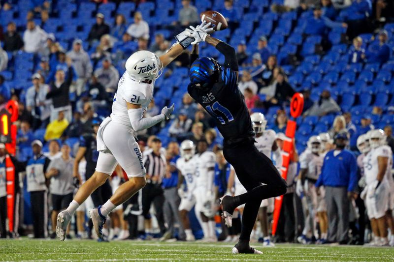 Nov 10, 2022; Memphis, Tennessee, USA; Tulsa Golden Hurricane defensive back Bryson Powers (21) breaks up a pass intended for Memphis Tigers wide receiver Joseph Scates (11) during the second half at Liberty Bowl Memorial Stadium. Mandatory Credit: Petre Thomas-USA TODAY Sports