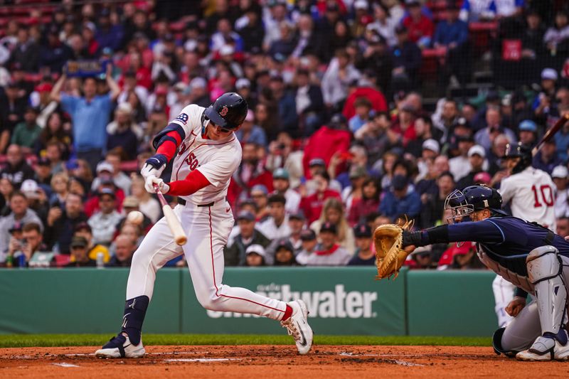 Jun 10, 2025; Boston, Massachusetts, USA; Boston Red Sox outfielder Roman Anthony (19) hits a double to drive in two runs against the Tampa Bay Rays in the first inning at Fenway Park. Mandatory Credit: David Butler II-Imagn Images
