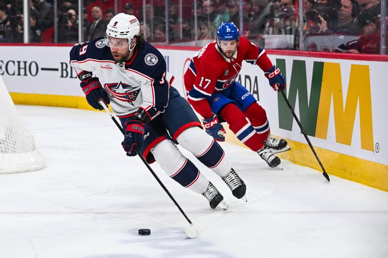 Mar 12, 2024; Montreal, Quebec, CAN; Columbus Blue Jackets defenseman Ivan Provorov (9) defends the puck against Montreal Canadiens right wing Josh Anderson (17) during the first period at Bell Centre. Mandatory Credit: David Kirouac-USA TODAY Sports