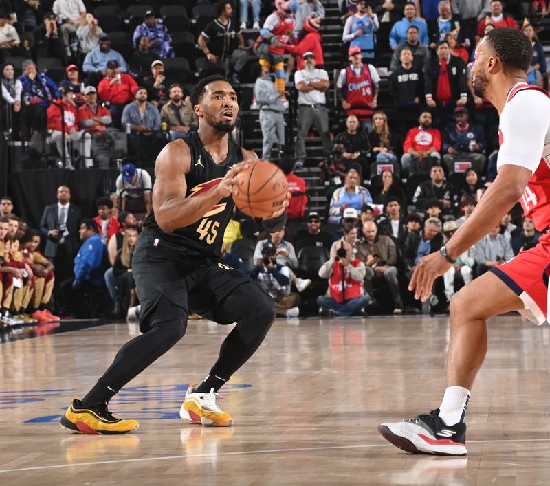 INGLEWOOD, CA - MARCH 18:  Donovan Mitchell #45 of the Cleveland Cavaliers handles the ball during the game against the LA Clippers on March 18, 2025 at Intuit Dome in Los Angeles, California. NOTE TO USER: User expressly acknowledges and agrees that, by downloading and/or using this Photograph, user is consenting to the terms and conditions of the Getty Images License Agreement. Mandatory Copyright Notice: Copyright 2025 NBAE (Photo by Juan Ocampo/NBAE via Getty Images)