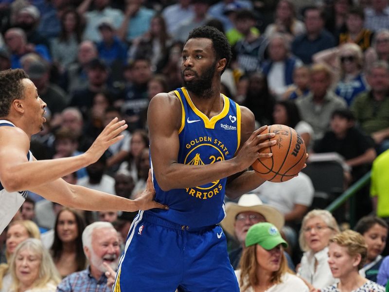 DALLAS, TX - MARCH 13: Andrew Wiggins #22 of the Golden State Warriors handles the ball during the game against the Dallas Mavericks on March 13, 2024 at the American Airlines Center in Dallas, Texas. NOTE TO USER: User expressly acknowledges and agrees that, by downloading and or using this photograph, User is consenting to the terms and conditions of the Getty Images License Agreement. Mandatory Copyright Notice: Copyright 2024 NBAE (Photo by Glenn James/NBAE via Getty Images)