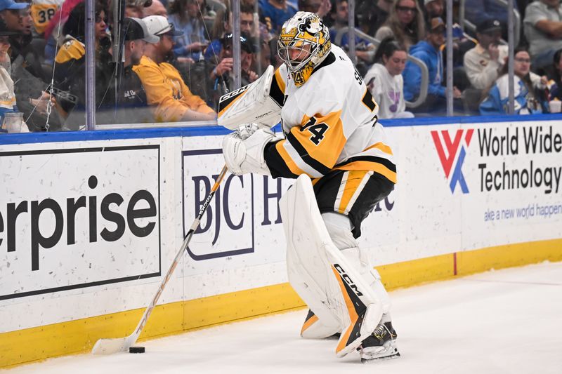 Apr 14, 2026; St. Louis, Missouri, USA; Pittsburgh Penguins goaltender Stuart Skinner (74) handles the puck during the second period against the St. Louis Blues at Enterprise Center. Mandatory Credit: Connor Hamilton-Imagn Images
