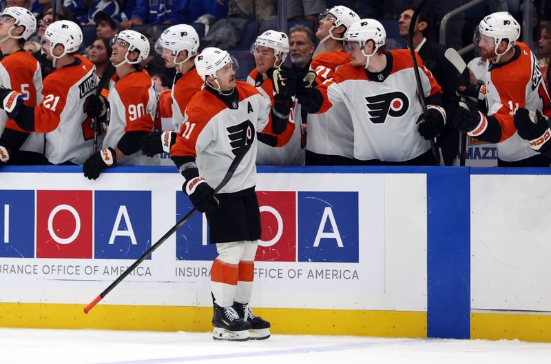 Nov 7, 2024; Tampa, Florida, USA; Philadelphia Flyers right wing Travis Konecny (11) celebrates after a goal during the overtime shootout against the Tampa Bay Lightning at Amalie Arena. Mandatory Credit: Kim Klement Neitzel-Imagn Images