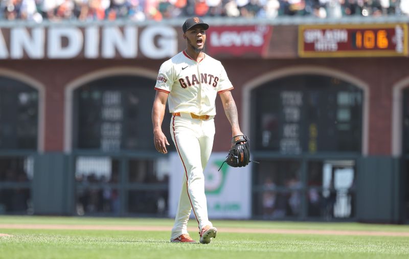 Jun 5, 2025; San Francisco, California, USA; San Francisco Giants relief pitcher Camilo Doval (75) celebrates after his 100th career save after the game against the San Diego Padres at Oracle Park. Mandatory Credit: Kelley L Cox-Imagn Images