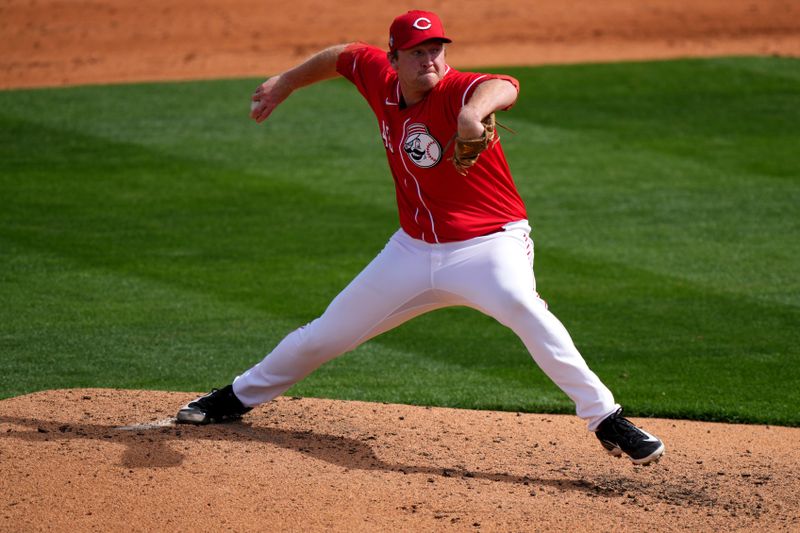 Feb 25, 2024;  Goodyear, Ariz USA; Cincinnati Reds relief pitcher Michael Byrne (43) delivers a pitch in the second inning during a MLB spring training baseball game against the Los Angeles Angelsat Goodyear Ballpark. Mandatory Credit: Kareem Elgazzar-USA TODAY Sports via The Cincinnati Enquirer