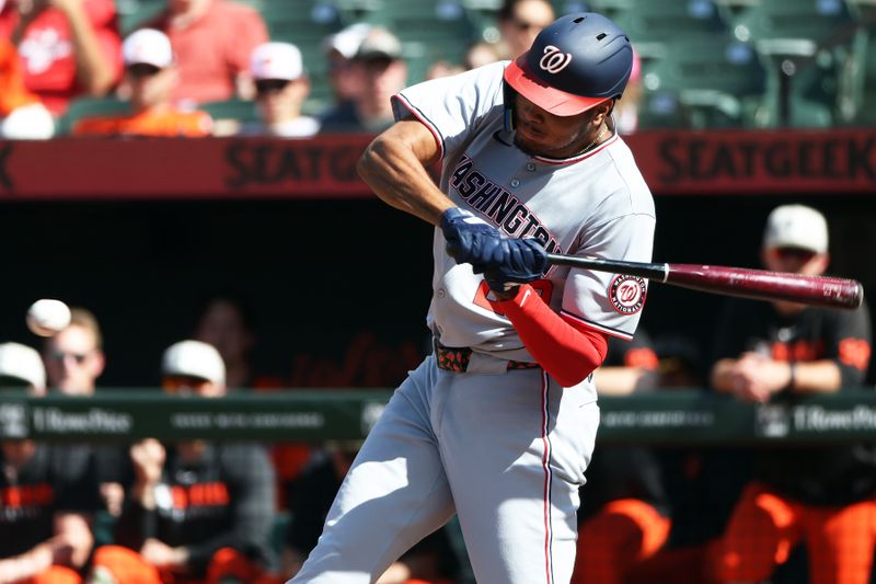 May 17, 2025; Baltimore, Maryland, USA; Washington Nationals outfielder James Wood (29) hits an RBI single during the first inning against the Baltimore Orioles at Oriole Park at Camden Yards. Mandatory Credit: Daniel Kucin Jr.-Imagn Images