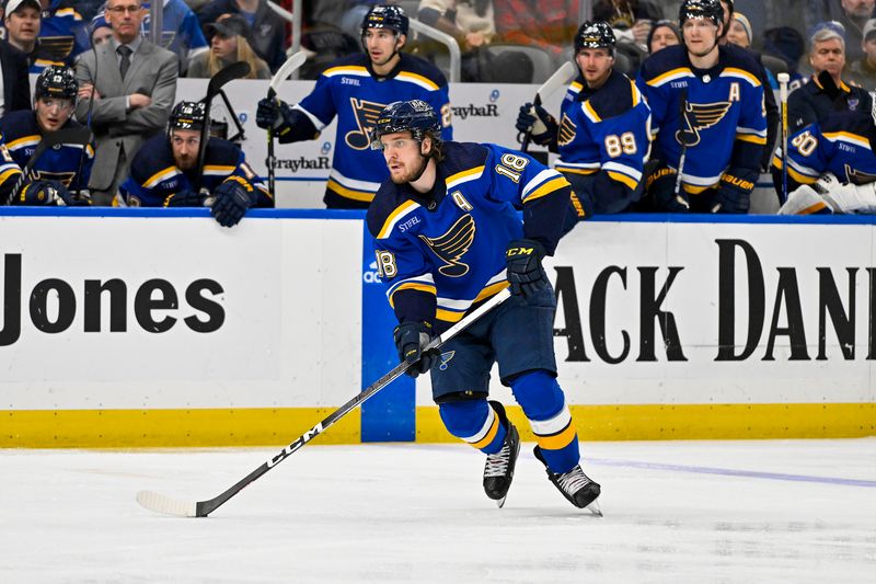 Feb 15, 2024; St. Louis, Missouri, USA;  St. Louis Blues center Robert Thomas (18) controls the puck against the Edmonton Oilers during the second period at Enterprise Center. Mandatory Credit: Jeff Curry-USA TODAY Sports