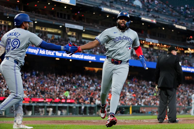 Jul 10, 2024; San Francisco, California, USA; Toronto Blue Jays first baseman Vladimir Guerrero Jr. (27) scores a run during the sixth inning against the San Francisco Giants at Oracle Park. Mandatory Credit: Sergio Estrada-USA TODAY Sports