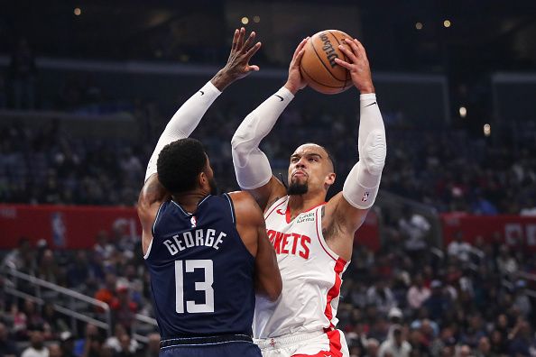 LOS ANGELES, CALIFORNIA - NOVEMBER 17: Dillon Brooks #9 of the Houston Rockets shoots the ball while defended by Paul George #13 of the Los Angeles Clippers in the first quarter of an NBA In-Season Tournament game at Crypto.com Arena on November 17, 2023 in Los Angeles, California. NOTE TO USER: User expressly acknowledges and agrees that, by downloading and or using this photograph, User is consenting to the terms and conditions of the Getty Images License Agreement. (Photo by Meg Oliphant/Getty Images)