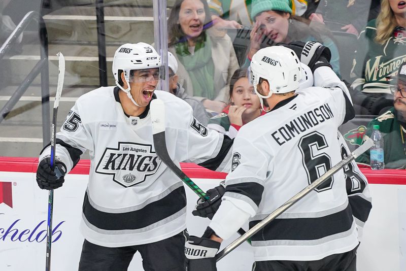 Nov 5, 2024; Saint Paul, Minnesota, USA; Los Angeles Kings right wing Quinton Byfield (55) celebrates his goal against the Minnesota Wild in the third period at Xcel Energy Center. Mandatory Credit: Brad Rempel-Imagn Images