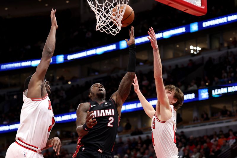 CHICAGO, ILLINOIS - FEBRUARY 04: Terry Rozier #2 of the Miami Heat shoots the ball as Jalen Smith #7 of the Chicago Bulls defends during the second quarter at the United Center on February 04, 2025 in Chicago, Illinois. NOTE TO USER: User expressly acknowledges and agrees that, by downloading and or using this photograph, user is consenting to the terms and conditions of the Getty Images License Agreement.  (Photo by Luke Hales/Getty Images)