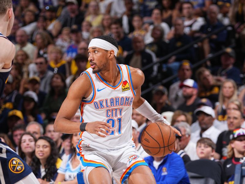 DENVER, CO - MAY 11: Aaron Wiggins #21 of the Oklahoma City Thunder dribbles the ball during the game against the Denver Nuggets  during Round 2 Game 4 of the 2025 NBA Playoffs on May 11, 2025 at Ball Arena in Denver, Colorado. NOTE TO USER: User expressly acknowledges and agrees that, by downloading and/or using this Photograph, user is consenting to the terms and conditions of the Getty Images License Agreement. Mandatory Copyright Notice: Copyright 2025 NBAE (Photo by Bart Young/NBAE via Getty Images)