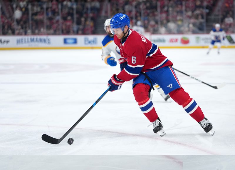 Jan 22, 2026; Montreal, Quebec, CAN;  Montreal Canadiens defenseman Mike Matheson (8) plays the puck during the second period against the Buffalo Sabres at the Bell Centre. Mandatory Credit: Eric Bolte-Imagn Images