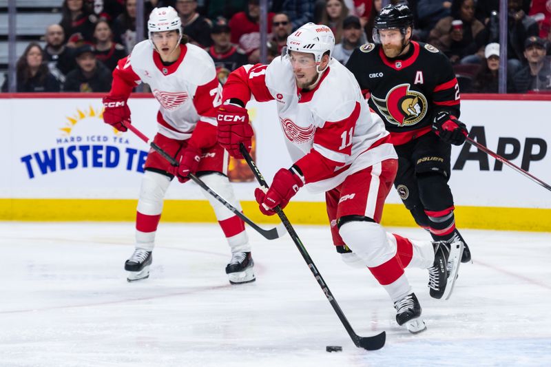 Mar 10, 2025; Ottawa, Ontario, CAN; Detroit Red Wings right wing Vladimir Tarasenko (11) skates with the puck in the first period agsainst the Senators at the Canadian Tire Centre. Mandatory Credit: Marc DesRosiers-Imagn Images