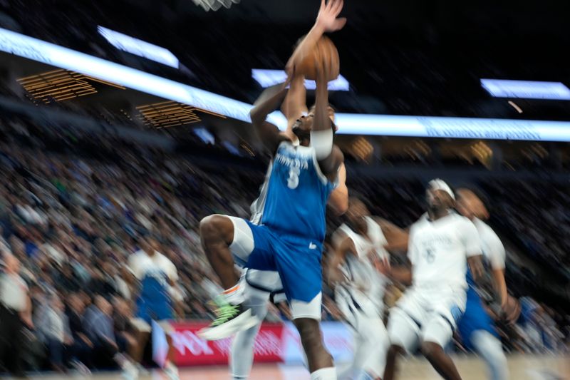 MINNEAPOLIS, MN -  FEBRUARY 28:  Anthony Edwards #5 of the Minnesota Timberwolves drives to the basket during the game against the Memphis Grizzlies on February 28, 2024 at Target Center in Minneapolis, Minnesota. NOTE TO USER: User expressly acknowledges and agrees that, by downloading and or using this Photograph, user is consenting to the terms and conditions of the Getty Images License Agreement. Mandatory Copyright Notice: Copyright 2024 NBAE (Photo by Jordan Johnson/NBAE via Getty Images)