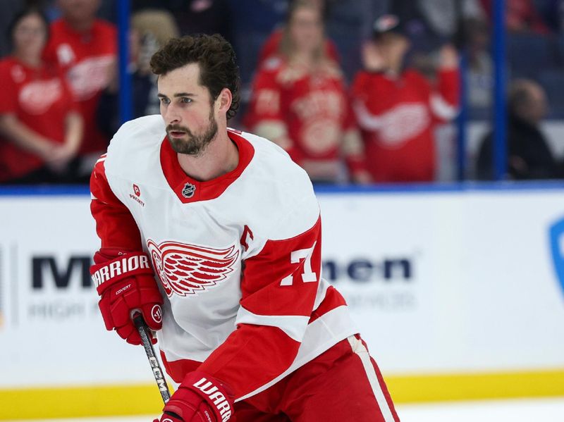 ]Jan 18, 2025; Tampa, Florida, USA; Detroit Red Wings center Dylan Larkin (71) warms up before a game against the Tampa Bay Lightning at Amalie Arena. Mandatory Credit: Nathan Ray Seebeck-Imagn Images