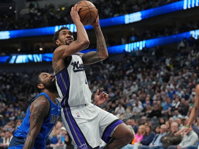 DALLAS, TX - FEBRUARY 10: Malik Monk #0 of the Sacramento Kings drives to the basket during the game against the Dallas Mavericks on February 10, 2025 at American Airlines Center in Dallas, Texas. NOTE TO USER: User expressly acknowledges and agrees that, by downloading and or using this photograph, User is consenting to the terms and conditions of the Getty Images License Agreement. Mandatory Copyright Notice: Copyright 2025 NBAE (Photo by Glenn James/NBAE via Getty Images)