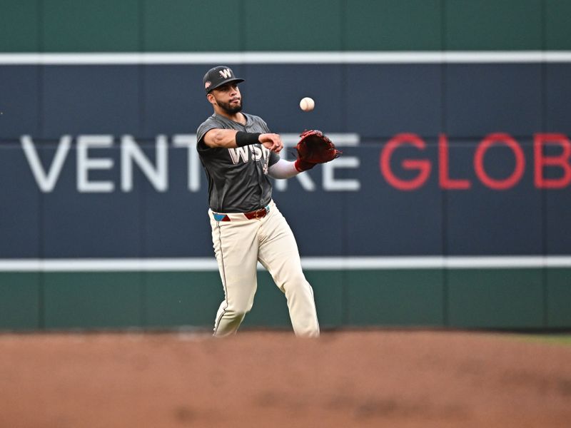 Aug 10, 2024; Washington, District of Columbia, USA;  Washington Nationals second baseman Luis Garcia Jr. (2) throws to first base during the first inning against the Los Angeles Angels at Nationals Park. Mandatory Credit: James A. Pittman-USA TODAY Sports