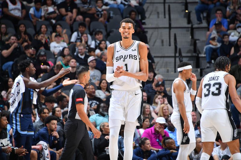 SAN ANTONIO, TX - MARCH 22  Victor Wembanyama #1 of the San Antonio Spurs smiles during the game against the Memphis Grizzlies on March 22, 2024 at the Frost Bank Center in San Antonio, Texas. NOTE TO USER: User expressly acknowledges and agrees that, by downloading and or using this photograph, user is consenting to the terms and conditions of the Getty Images License Agreement. Mandatory Copyright Notice: Copyright 2024 NBAE (Photos by Michael Gonzales/NBAE via Getty Images)