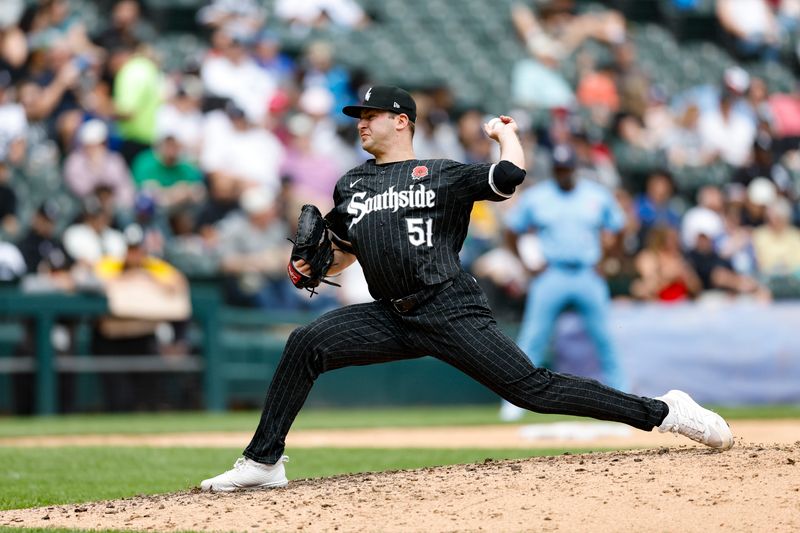 May 27, 2024; Chicago, Illinois, USA; Chicago White Sox relief pitcher Jared Shuster (51) delivers a pitch against the Toronto Blue Jays during the seventh inning at Guaranteed Rate Field. Mandatory Credit: Kamil Krzaczynski-USA TODAY Sports