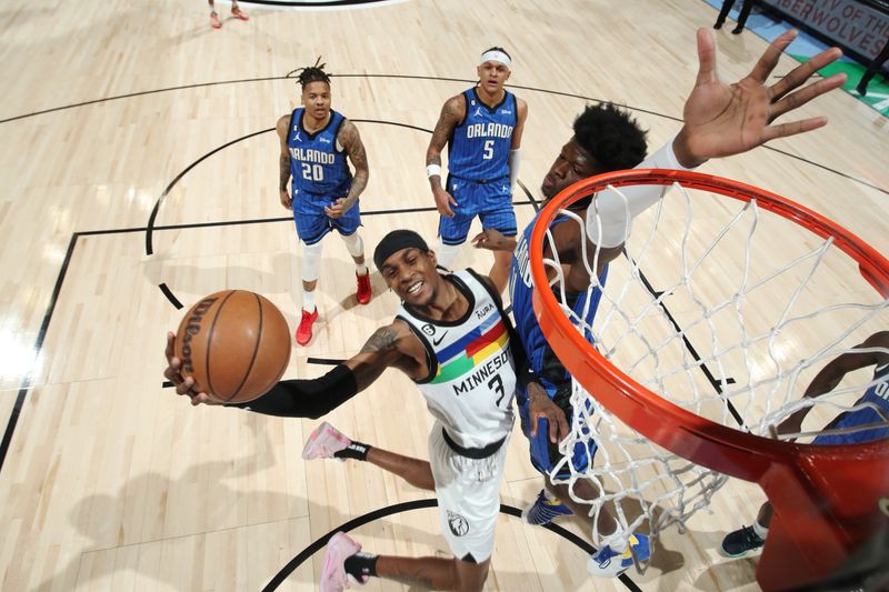 MINNEAPOLIS, MN -  FEBRUARY 3: Jaden McDaniels #3 of the Minnesota Timberwolves drives to the basket during the game against the Orlando Magic on February 3, 2023 at Target Center in Minneapolis, Minnesota. NOTE TO USER: User expressly acknowledges and agrees that, by downloading and or using this Photograph, user is consenting to the terms and conditions of the Getty Images License Agreement. Mandatory Copyright Notice: Copyright 2022 NBAE (Photo by Jordan Johnson/NBAE via Getty Images)