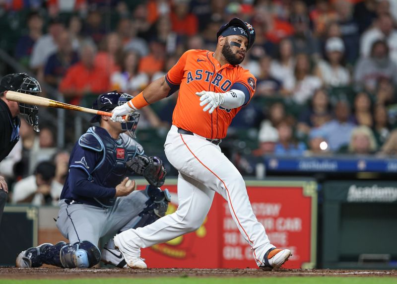 Aug 2, 2024; Houston, Texas, USA; Houston Astros first baseman Jon Singleton (28) strikes out during the second inning against the Tampa Bay Rays at Minute Maid Park. Mandatory Credit: Troy Taormina-USA TODAY Sports