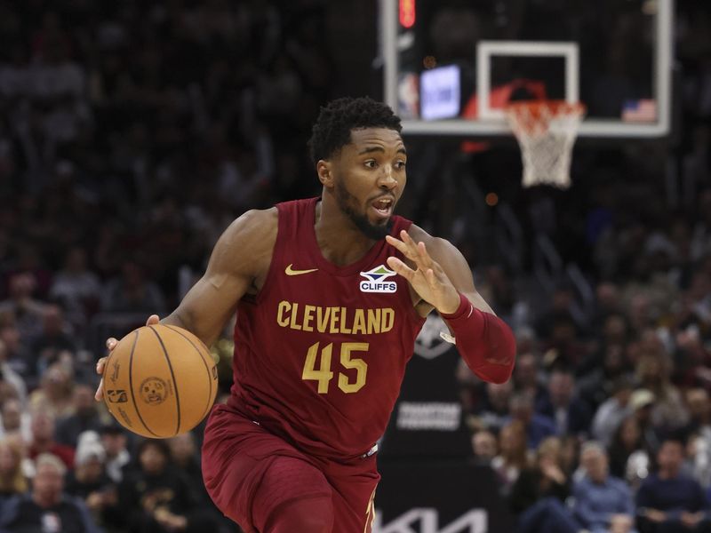 CLEVELAND, OH - NOVEMBER 4:  Donovan Mitchell #45 of the Cleveland Cavaliers dribbles the ball during the game against the Milwaukee Bucks on November 4, 2024 at Rocket Mortgage FieldHouse in Cleveland, Ohio. NOTE TO USER: User expressly acknowledges and agrees that, by downloading and/or using this Photograph, user is consenting to the terms and conditions of the Getty Images License Agreement. Mandatory Copyright Notice: Copyright 2024 NBAE (Photo by  Lauren Leigh Bacho/NBAE via Getty Images)