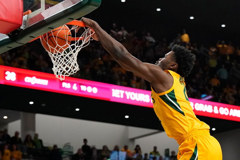 Jan 13, 2024; Waco, Texas, USA; Baylor Bears center Yves Missi (21) goes up for the dunk against the Cincinnati Bearcats during the second half at Paul and Alejandra Foster Pavilion. Mandatory Credit: Raymond Carlin III-USA TODAY Sports