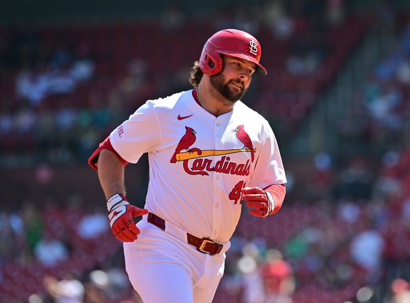Sep 17, 2025; St. Louis, Missouri, USA; St. Louis Cardinals first baseman Alec Burleson (41) rounds the bases after hitting a home run in the first inning against the Cincinnati Reds at Busch Stadium. Mandatory Credit: Tim Vizer-Imagn Images
