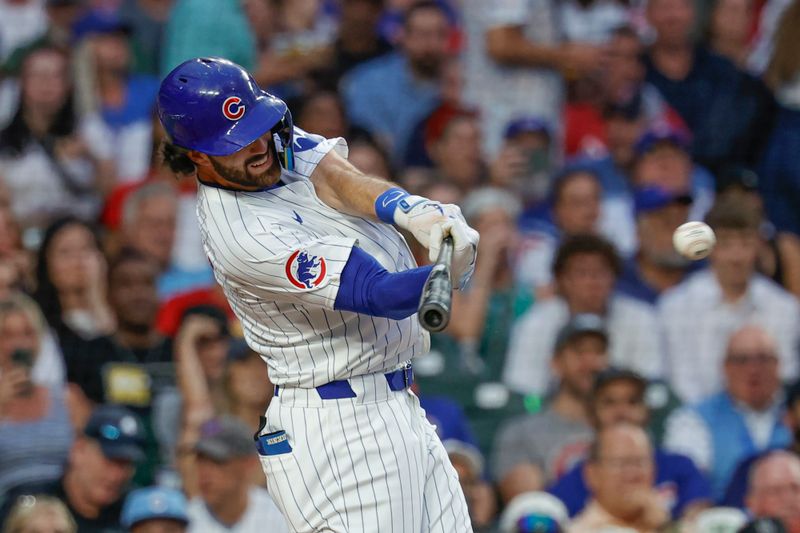 Aug 1, 2024; Chicago, Illinois, USA; Chicago Cubs shortstop Dansby Swanson (7) hits an RBI-single against the St. Louis Cardinals during the second inning at Wrigley Field. Mandatory Credit: Kamil Krzaczynski-USA TODAY Sports