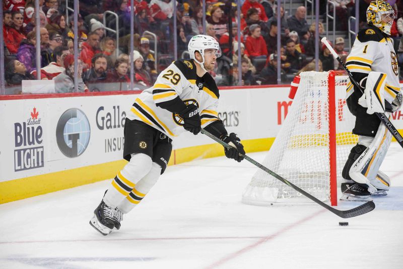 Nov 23, 2024; Detroit, Michigan, USA; Boston Bruins defenseman Parker Wotherspoon (29) handles the puck during the second period at Little Caesars Arena. Mandatory Credit: Brian Bradshaw Sevald-Imagn Images