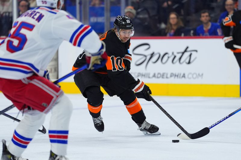 Nov 29, 2024; Philadelphia, Pennsylvania, USA; Philadelphia Flyers right wing Bobby Brink (10) controls the puck against the New York Rangers in the first period at Wells Fargo Center. Mandatory Credit: Kyle Ross-Imagn Images