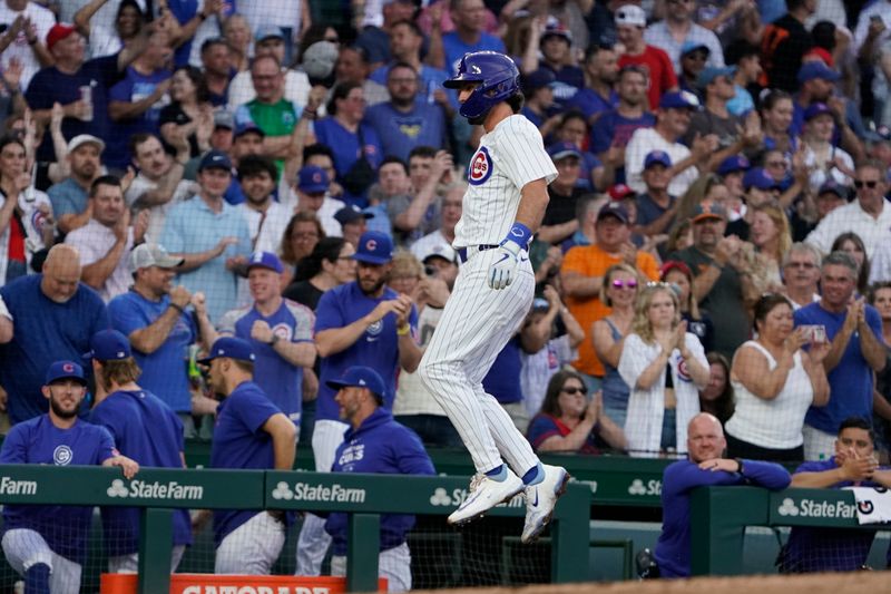 Jun 18, 2024; Chicago, Illinois, USA; Chicago Cubs shortstop Dansby Swanson (7) jumps after hitting a two-run home run against the San Francisco Giants during the second inning at Wrigley Field. Mandatory Credit: David Banks-USA TODAY Sports