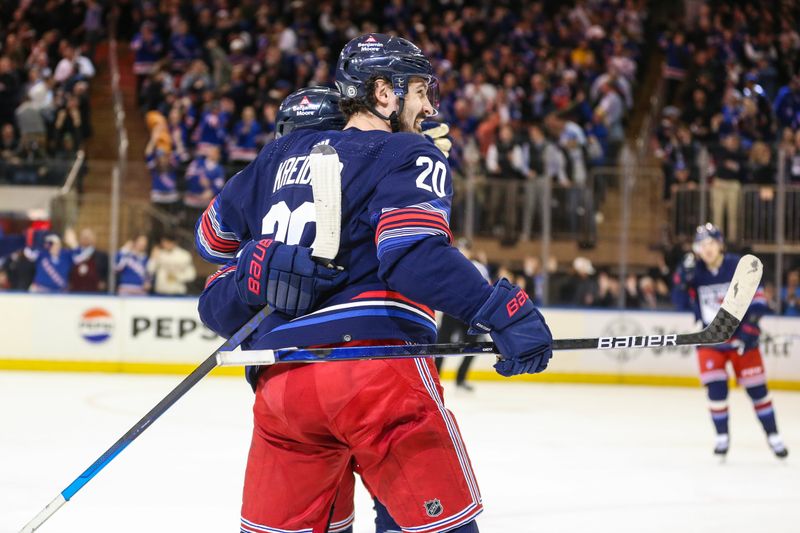 Apr 3, 2024; New York, New York, USA; New York Rangers left wing Chris Kreider (20) celebrates after scoring the go ahead goal in the third period against the New Jersey Devils at Madison Square Garden. Mandatory Credit: Wendell Cruz-USA TODAY Sports