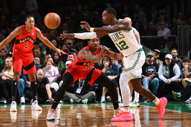 BOSTON, MA - OCTOBER 13: Lonnie Walker IV #12 of the Boston Celtics passes the ball during the game against the Toronto Raptors during a NBA pre season game on October 13, 2024 at TD Garden in Boston, Massachusetts. NOTE TO USER: User expressly acknowledges and agrees that, by downloading and/or using this Photograph, user is consenting to the terms and conditions of the Getty Images License Agreement. Mandatory Copyright Notice: Copyright 2024 NBAE (Photo by Brian Babineau/NBAE via Getty Images)