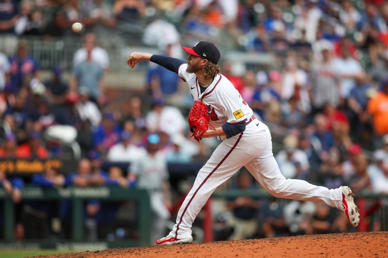 Sep 30, 2024; Atlanta, Georgia, USA; Atlanta Braves relief pitcher Pierce Johnson (38) throws against the New York Mets in the ninth inning at Truist Park. Mandatory Credit: Brett Davis-Imagn Images
