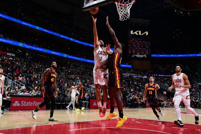 ATLANTA, GA - JANUARY 20: Max Strus #1 of the Cleveland Cavaliers drives to the basket during the game against the Atlanta Hawks on January 20, 2024 at State Farm Arena in Atlanta, Georgia.  NOTE TO USER: User expressly acknowledges and agrees that, by downloading and/or using this Photograph, user is consenting to the terms and conditions of the Getty Images License Agreement. Mandatory Copyright Notice: Copyright 2024 NBAE (Photo by Scott Cunningham/NBAE via Getty Images)