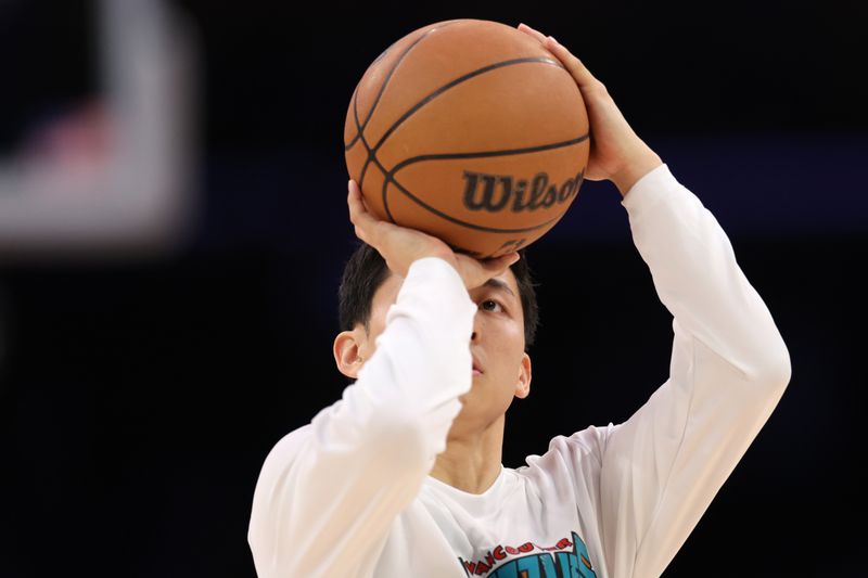 LOS ANGELES, CALIFORNIA - NOVEMBER 13: Yuki Kawamura #17 of the Memphis Grizzlies warms up during halftime of the game against the Los Angeles Lakers at Crypto.com Arena on November 13, 2024 in Los Angeles, California. NOTE TO USER: User expressly acknowledges and agrees that, by downloading and or using this photograph, User is consenting to the terms and conditions of the Getty Images License Agreement.  (Photo by Harry How/Getty Images)